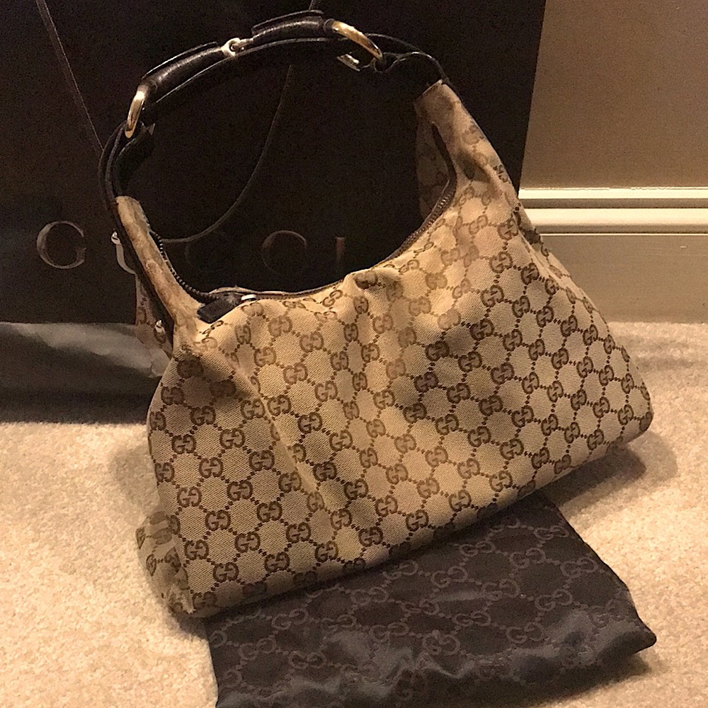 Authentic Gucci bag for sale with Dust cover, good used condition